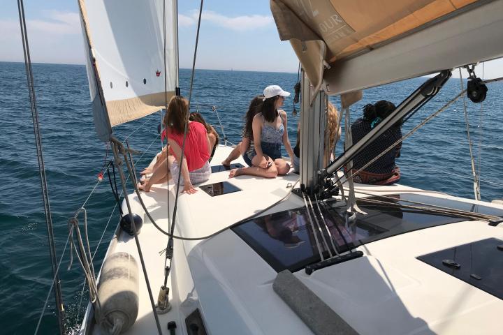 a boat is docked next to a body of water