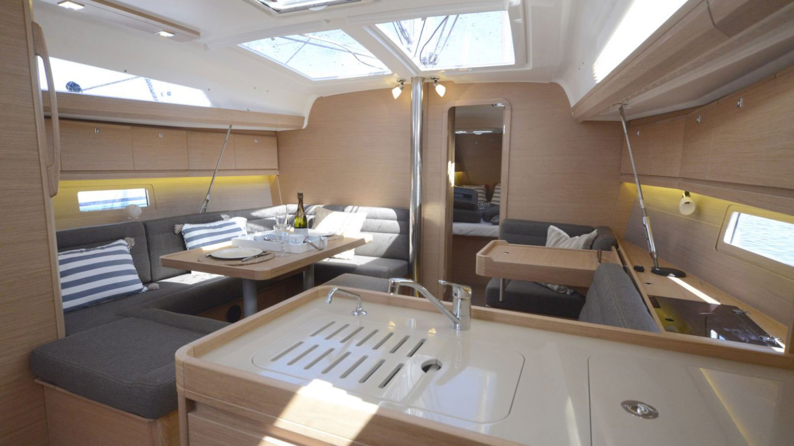a large white tub next to a sink