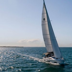 a sailing boat in a body of water